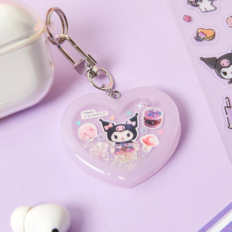 Officially licensed Sanrio handmade heart-shaped water shaker keychains in pastel pink featuring My Melody and pastel purple featuring Kuromi
