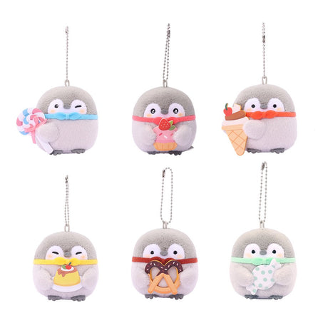 A collection of six Spiralcute officially licensed Koupen Chan plush keychains, each featuring the small grey penguin holding a different dessert like a cupcake or pretzel. Every plush includes a colorful bowtie and a silver ball chain for easy hanging.
