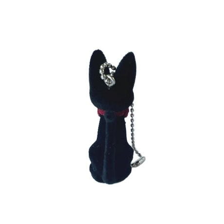 Officially licensed Studio Ghibli Kiki's Delivery Service Jiji the black cat flocked keychain with a red bow and soft fuzzy texture, suspended by a silver ball chain.