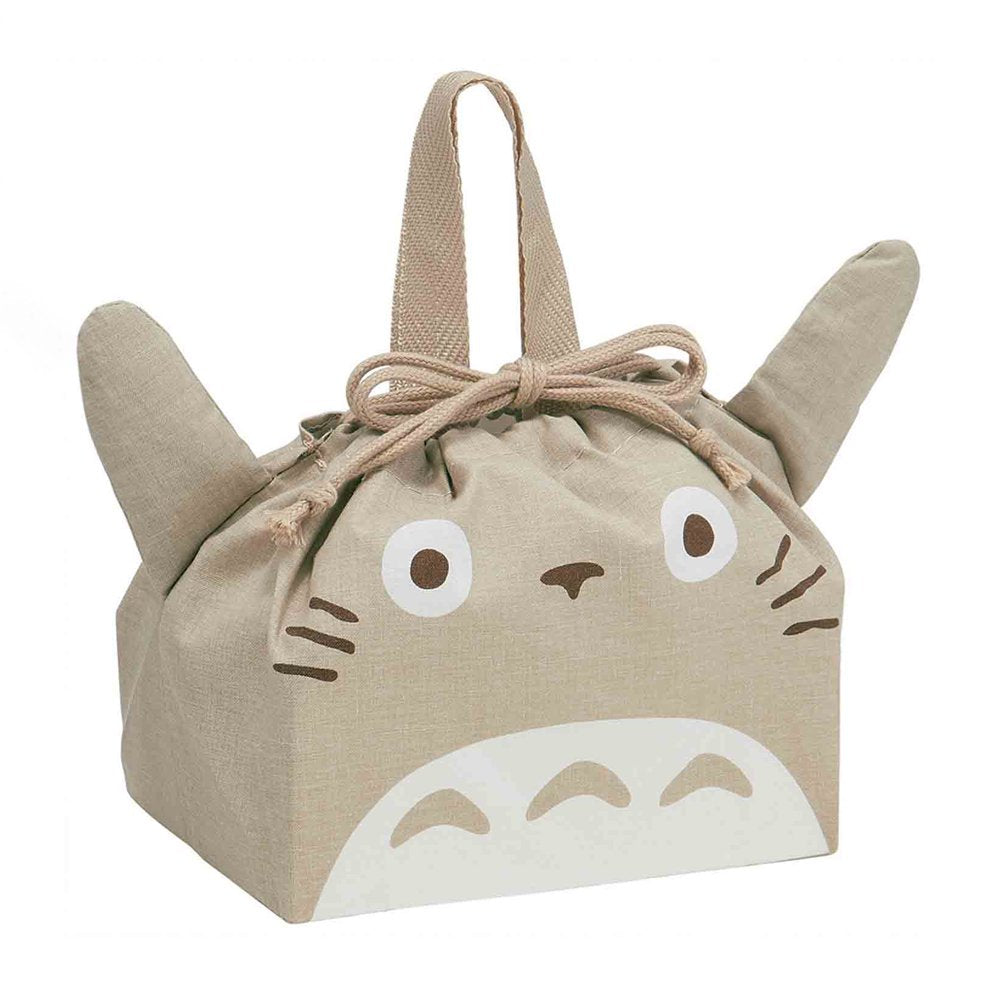 Officially licensed My Neighbor Totoro die-cut drawstring lunch pouch featuring 3D ears, Totoro's face, a drawstring tie, and top handles on natural beige fabric