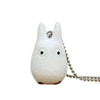 Officially licensed Studio Ghibli small White Totoro (Chibi-Totoro) flocked mascot keychain, featuring a fuzzy white texture and black eyes.