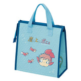 Officially licensed Ponyo Skater insulated tote bag in bright sky blue with dark blue trim, featuring Ponyo and her sisters swimming with bubbles