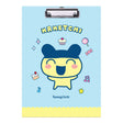 Two officially licensed Tamagotchi clipboards: one light blue featuring Mametchi with cupcakes and sweets, and one pale yellow featuring Kuchipatchi with stars and snacks. Both clipboards include a silver metal clip and the official Tamagotchi logo.
