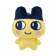 Officially licensed Tamagotchi plush keychain of the character Mametchi, featuring a yellow body, blue pointed ears, rosy cheeks, and a ball-chain attachment for bags or keys.