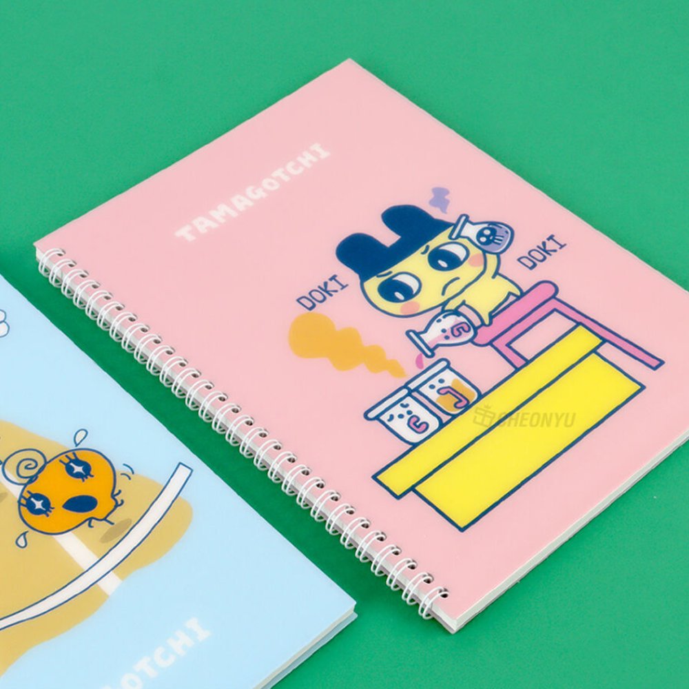 A set of four officially licensed Tamagotchi spiral notebooks in yellow, purple, blue, and pink, each featuring different character illustrations.
