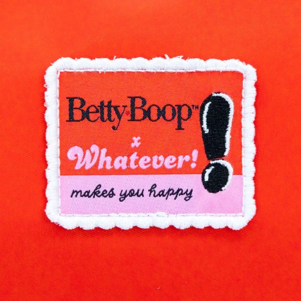 A vibrant red Betty Boop shoulder bag featuring a glossy patent red bow, heart appliqués, and iconic character graphics of Betty Boop and red lips, with a slim over-the-shoulder strap.