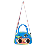 An officially licensed Whatever! blue dome-shaped handbag featuring a large character face with giant black eyes and pink cheeks. The bag is decorated with a green bat-winged patch, a star, and a lightning bolt. It includes blue top handles and a detachable rainbow-striped shoulder strap.
