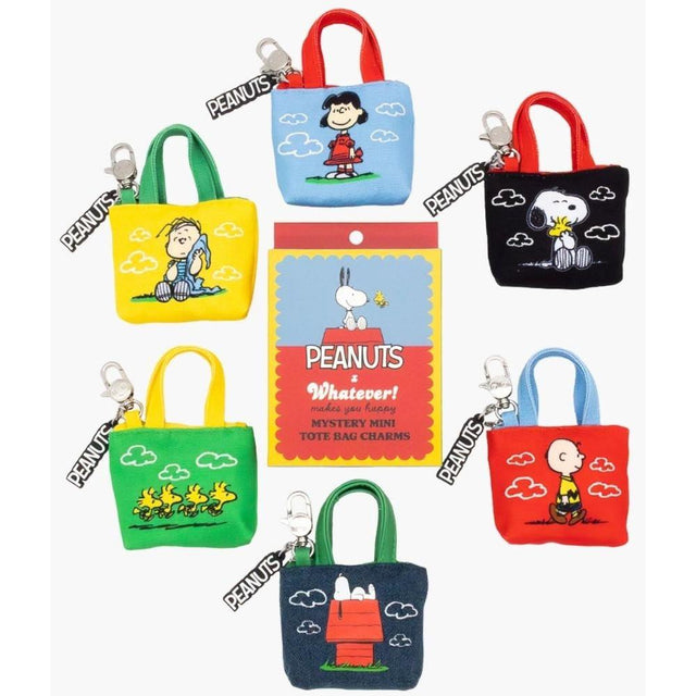 Set of small tote bags with Peanuts character designs on a white background