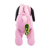 A pink corduroy plush bag shaped like Snoopy with floppy black ears, featuring a small top handle, a detachable pink shoulder strap, and a colorful yellow and blue "PEANUTS" patch on the side