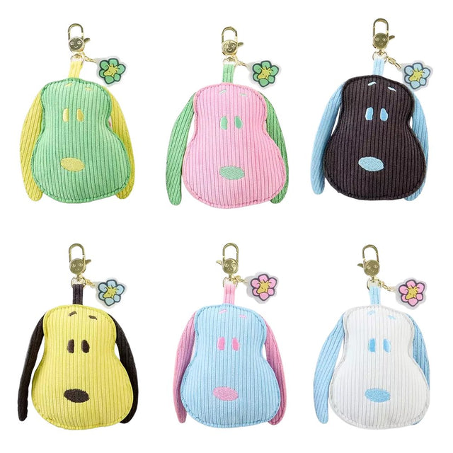 Six distinct flower-themed Snoopy head corduroy pouch charms in a variety of colorways, including green, pink, dark brown, yellow, light blue, and white, arranged in two rows
