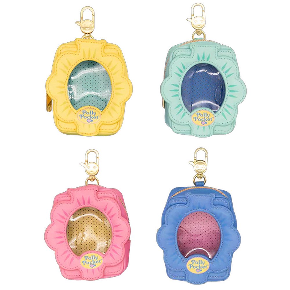 A collection of Polly Pocket mystery items including four colorful character enamel pins and four flower-shaped miniature bag charm keychains in yellow, pink, blue, and mint green.