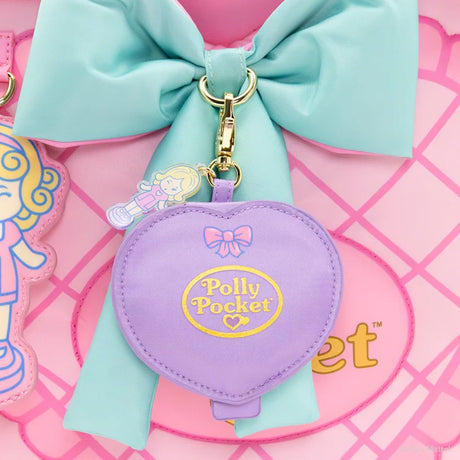 A collection of six Polly Pocket mystery mirror compact bag charms in various shapes of heart, star, shell, and flower and pastel shades of purple, pink, blue, yellow, green, and orange. The charms feature gold lobster clips and acrylic character tags.