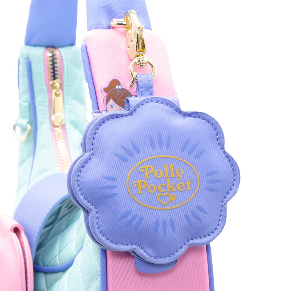 A collection of six Polly Pocket mystery mirror compact bag charms in various shapes of heart, star, shell, and flower and pastel shades of purple, pink, blue, yellow, green, and orange. The charms feature gold lobster clips and acrylic character tags.