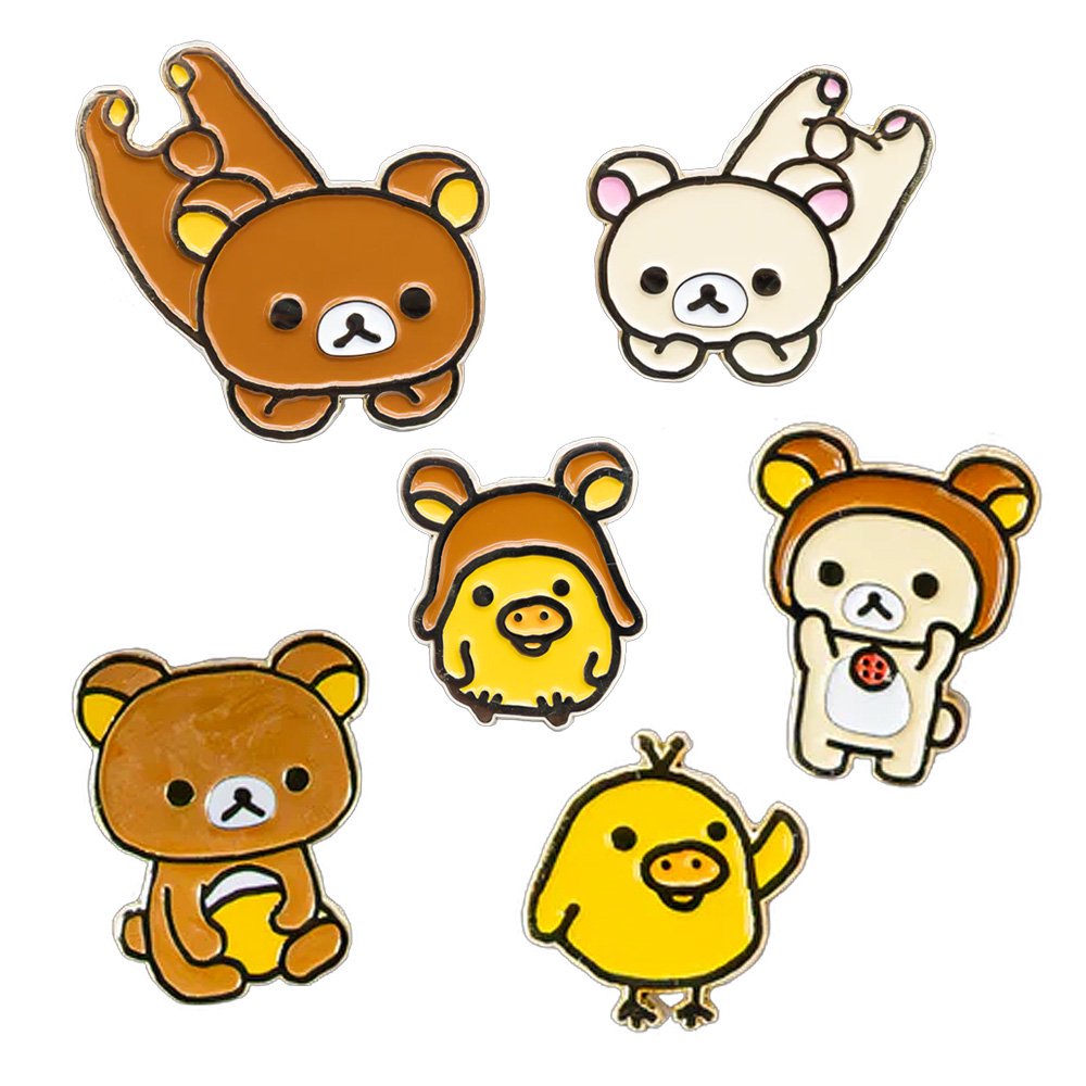 A blind box collection featuring six officially licensed enamel pins of Rilakkuma, Korilakkuma, and Kiiroitori.