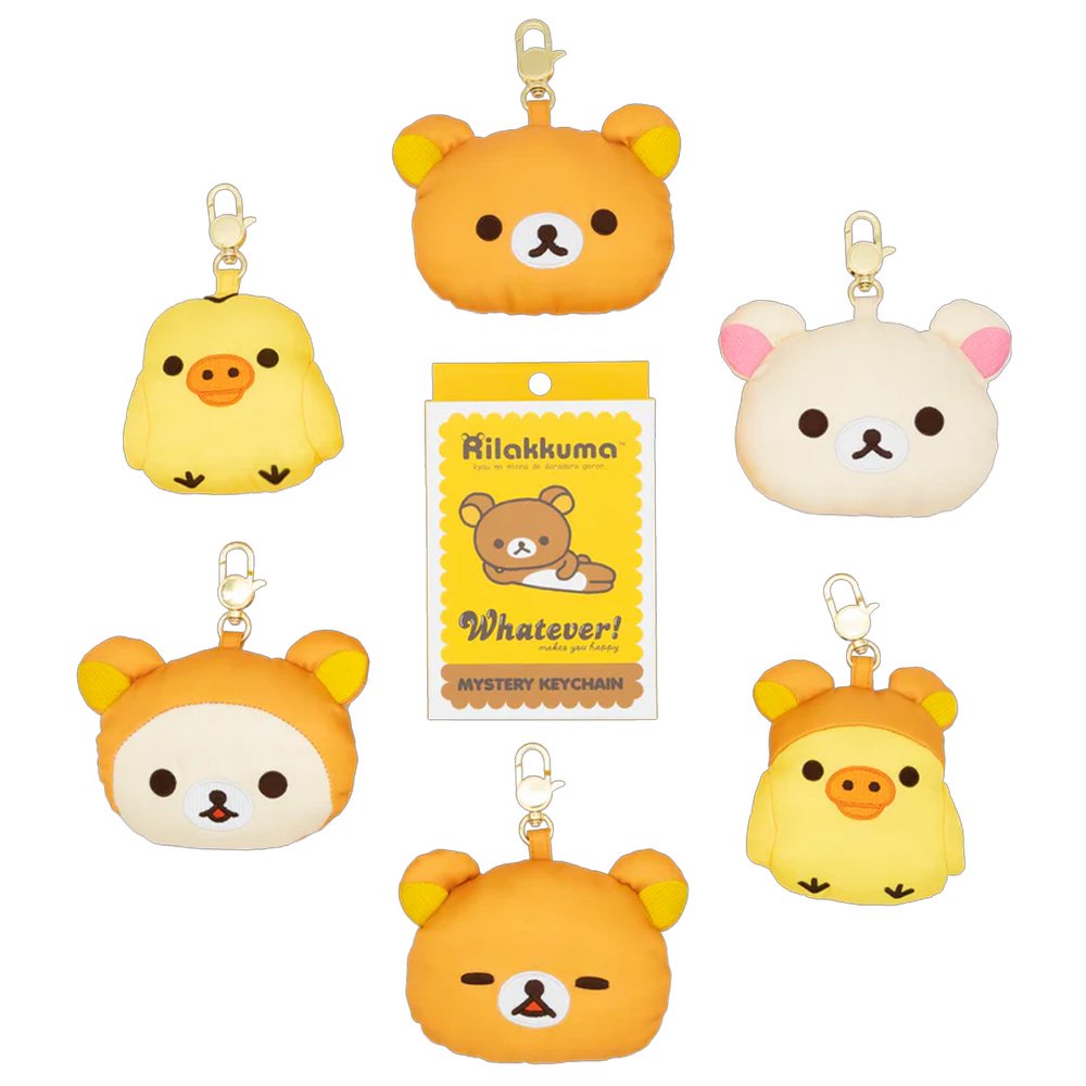 An officially licensed collection of Rilakkuma mystery plush keychains include Rilakkuma with various expressions, Korilakkuma, Kiiroitori, and characters wearing bear-themed hoods. Each plush features a gold-tone lobster clasp.
