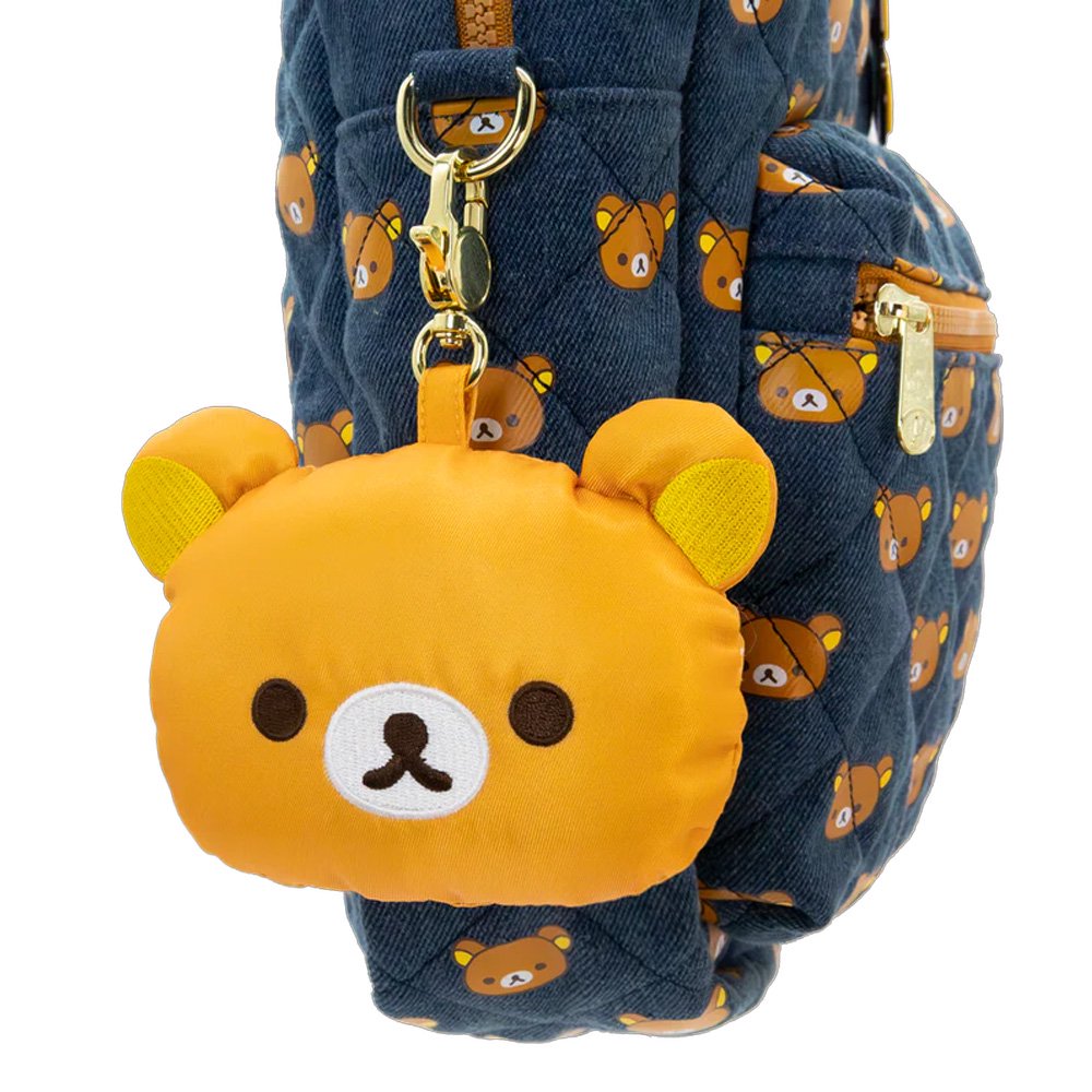 An officially licensed collection of Rilakkuma mystery plush keychains include Rilakkuma with various expressions, Korilakkuma, Kiiroitori, and characters wearing bear-themed hoods. Each plush features a gold-tone lobster clasp.