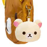 An officially licensed collection of Rilakkuma mystery plush keychains include Rilakkuma with various expressions, Korilakkuma, Kiiroitori, and characters wearing bear-themed hoods. Each plush features a gold-tone lobster clasp.
