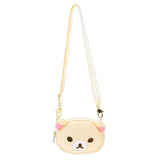 An officially licensed Korilakkuma puffy crossbody bag in an ivory color, shaped like the character's head with round ears. The bag includes a detachable ivory shoulder strap with gold-tone hardware.