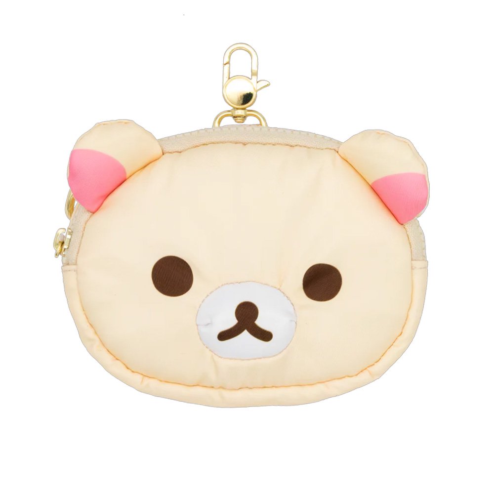 An officially licensed Korilakkuma puffy crossbody bag in an ivory color, shaped like the character's head with round ears. The bag includes a detachable ivory shoulder strap with gold-tone hardware.