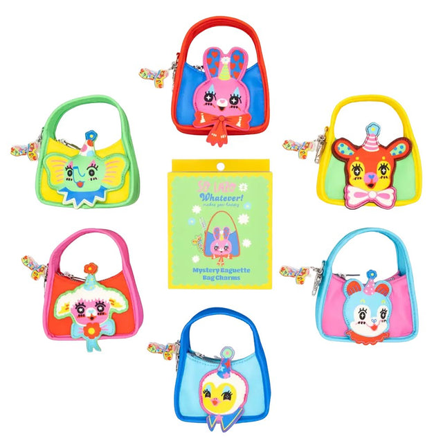 Six miniature, colorful baguette-shaped bag charms featuring whimsical circus animal faces designed by artist So Lazo, arranged around a green and yellow mystery packaging box
