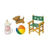 Set of miniature Miffy items including a dog, a beach ball, a milkshake, and a director's chair with a green seat on a white background.