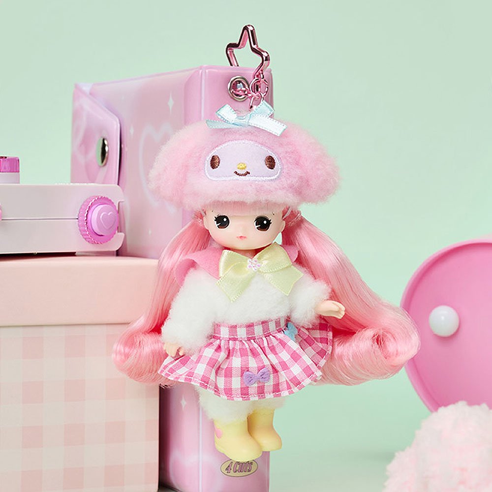 My Melody x Mimi doll with pink hair and checkered skirt in a pink and white setting