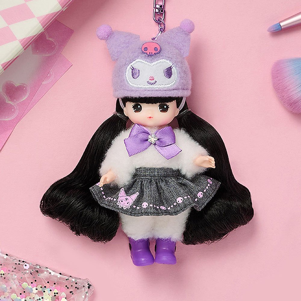 Little mimi x Kuromi doll with long black hair and a purple outfit, wearing a matching hat, on a pink background.