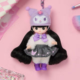 Little mimi x Kuromi doll with long black hair and a purple outfit, wearing a matching hat, on a pink background.