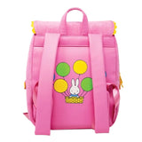 Officially licensed Miffy backpack in pink corduroy. The front features Miffy's face on a round clear window pocket, and the flap is shaped like bunny ears with yellow trim. The back has a graphic of Miffy riding in a hot air balloon with green and yellow balloons.
