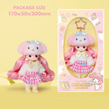 Kawaii-style My Melody doll with pink hair and checkered dress next to its packaging on a yellow background