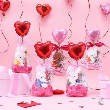 Official Miffy Valentine's Day Premium Gift Set collection. 5 unique Miffy plushie gift bags with red and pink heart balloons, satin ribbons, and premium tissue paper stuffing. Luxury Miffy & Friends holiday gift ideas for girlfriend or aesthetic room decor.
