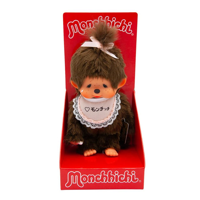 Officially Licensed Sekiguchi Monchhichi Crying Girl 8 Inch Plush Doll in original red display box packaging, featuring a tear on her cheek, pink hair bow, and pink lace bib, perfect Christmas gift and holiday present for Monchhichi collectors