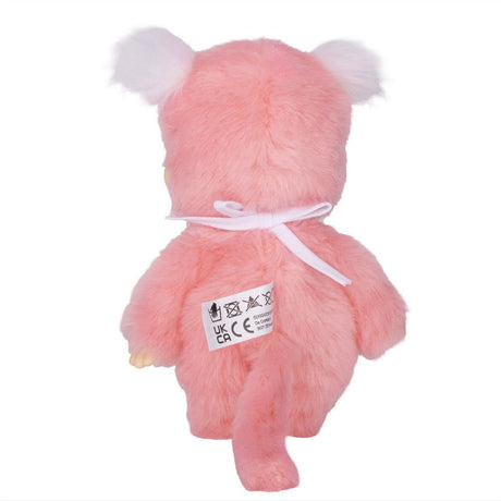 Back view of Sekiguchi Monchhichi New Pink Pigtails Girl 8 Inch Plush Doll showing pink plush tail, authentic product tag, and tied white ribbon string on her back