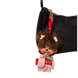 Sekiguchi Monchhichi Sakura Kimono Girl Clip-On Mascot Plush Keychain attached to a black shoulder bag as a trendy Japanese plush charm accessory, ideal holiday season gift and purse decor