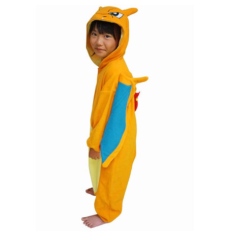 Official Pokémon Charizard Kids Costume Kigurumi Onesie Jumpsuit worn by a young model spreading the attached dragon wings. Features a bright orange fleece body, cream belly panel, and a Charizard face hood with horns. Perfect for kids' Halloween costumes, sleepover parties, and year-end holiday gifts.