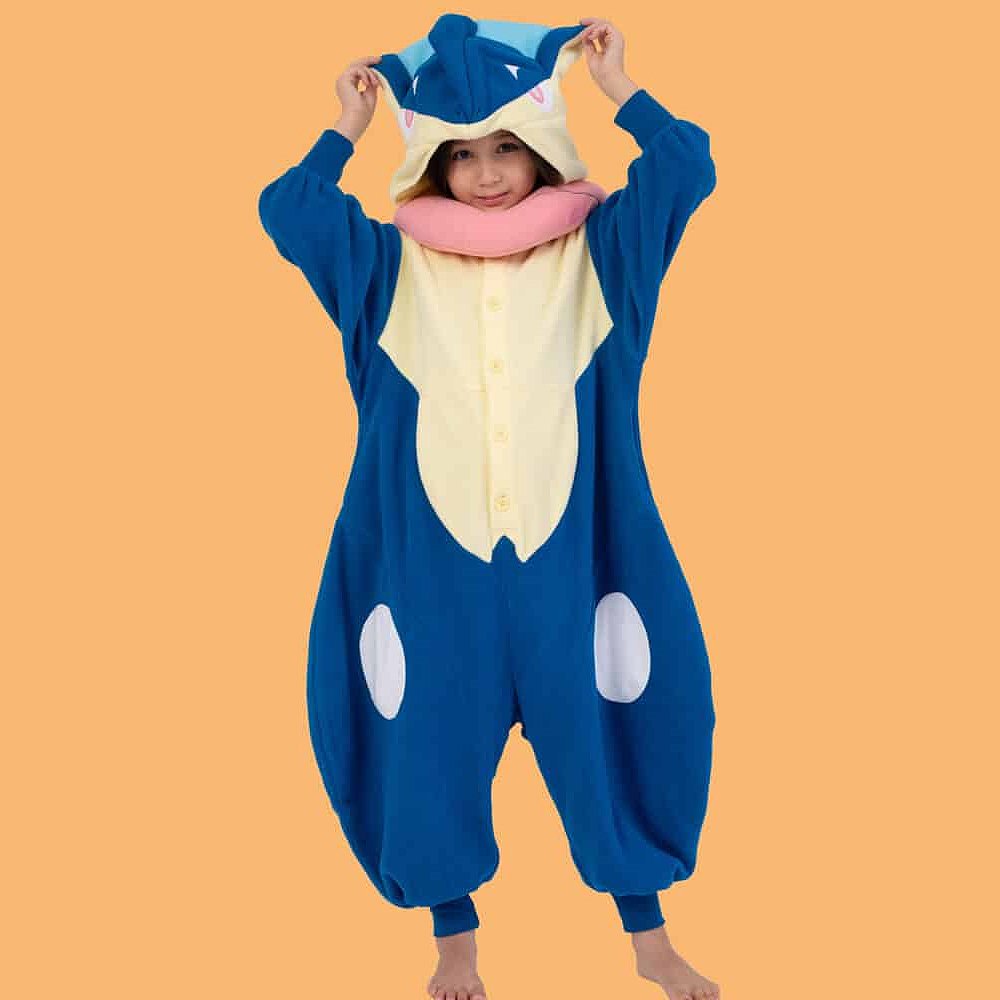 Official Pokémon Greninja Kids Costume Kigurumi Onesie Jumpsuit worn by a young model holding the hooded ears. Features a soft blue fleece body, cream chest panel, white knee spots, and a plush pink tongue scarf collar. Perfect for kids' Halloween costumes, cosplay party suits, sleepovers, and holiday gifts.