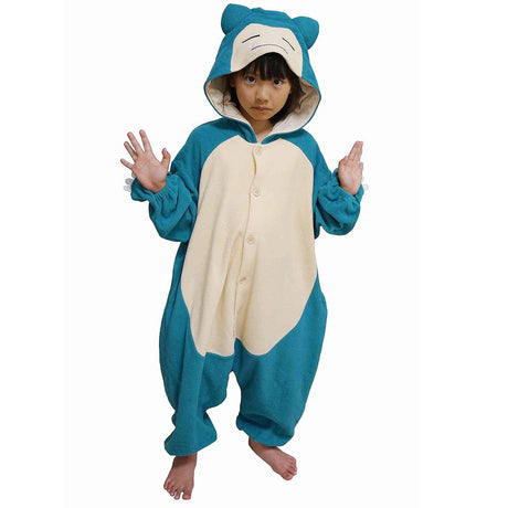 Official Pokémon Snorlax Kids Costume Kigurumi Onesie Jumpsuit worn by a young model. Features a soft teal-blue and cream fleece body, paw sleeves with white claws, and a sleeping Snorlax face hood. Perfect for kids' Halloween costumes, sleepover party pajamas, and holiday gifts