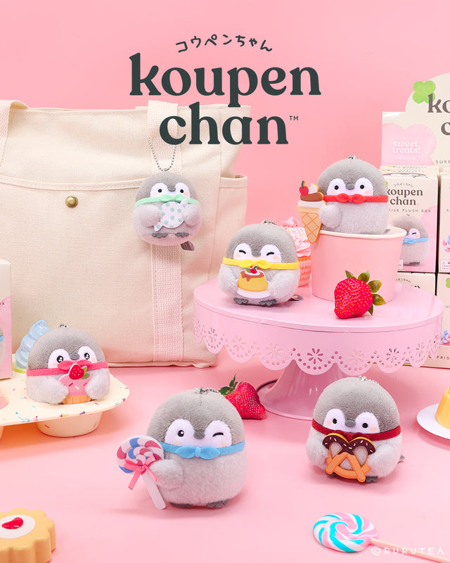 An Official Spiralcute licensed Koupen Chan Sweet Treats Plush Blind Box collection featuring six miniature penguin plushies with colorful dessert props arranged around a pink cake stand and a canvas tote bag, serving as an aesthetic bag charm and desk accessory for emotional support.