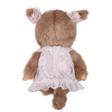 Back view of Sekiguchi Monchhichi Beige Girl 8 Inch Plush Doll showing cute plush tail and back closure of white lace dress with twin pigtail lace ribbons