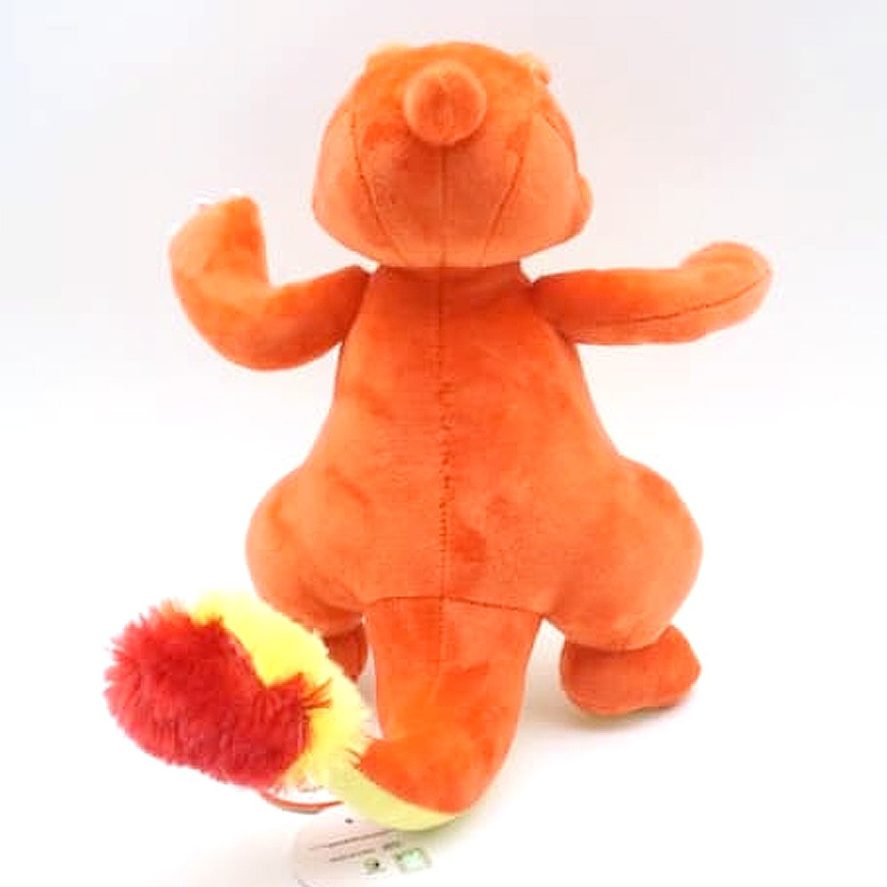 A plush toy of the Pokemon Charmeleon, predominantly orange with a yellow belly, official Nintendo branding.